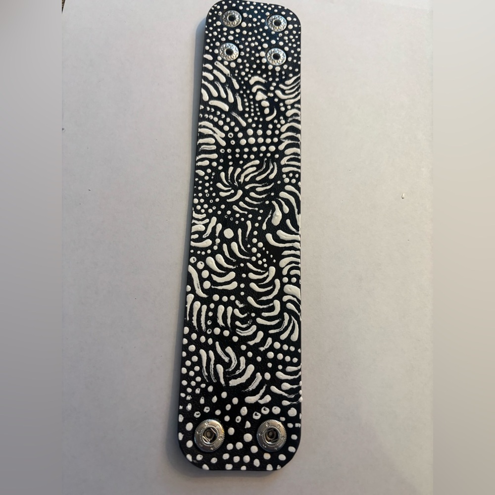 Hand painted one of a kind black and white abstract cuff bracelet.